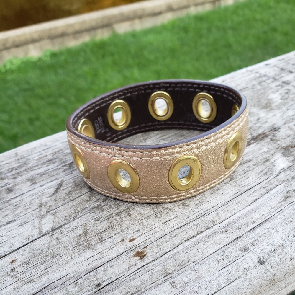 COACH POPPY!! BRAND NEW!! Authentic Coach gold leather bracelet w gold grommets